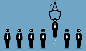 cartoon claw machine picking one employee