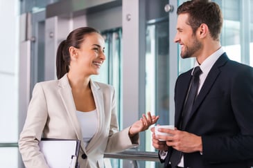 a man and a woman having a conversation