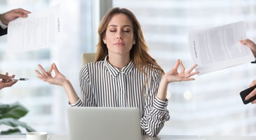 businesswoman in meditation pose