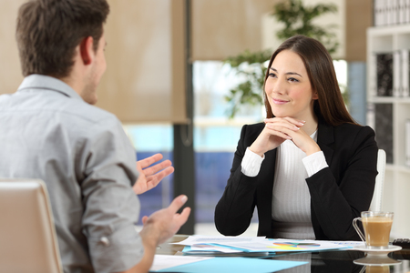 a woman listening to her client