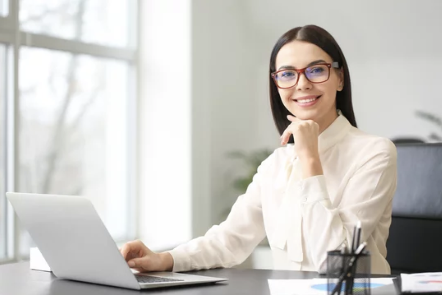 smiling female accountant working in office